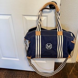 Pottery Barn Kids navy diaper bag with shoulder strap and handles